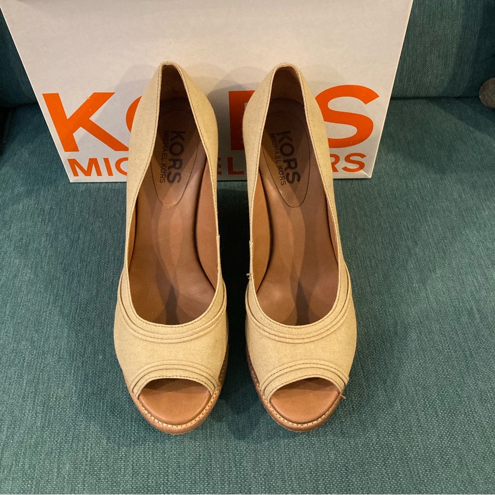 Michael Kors natural canvas wedges.